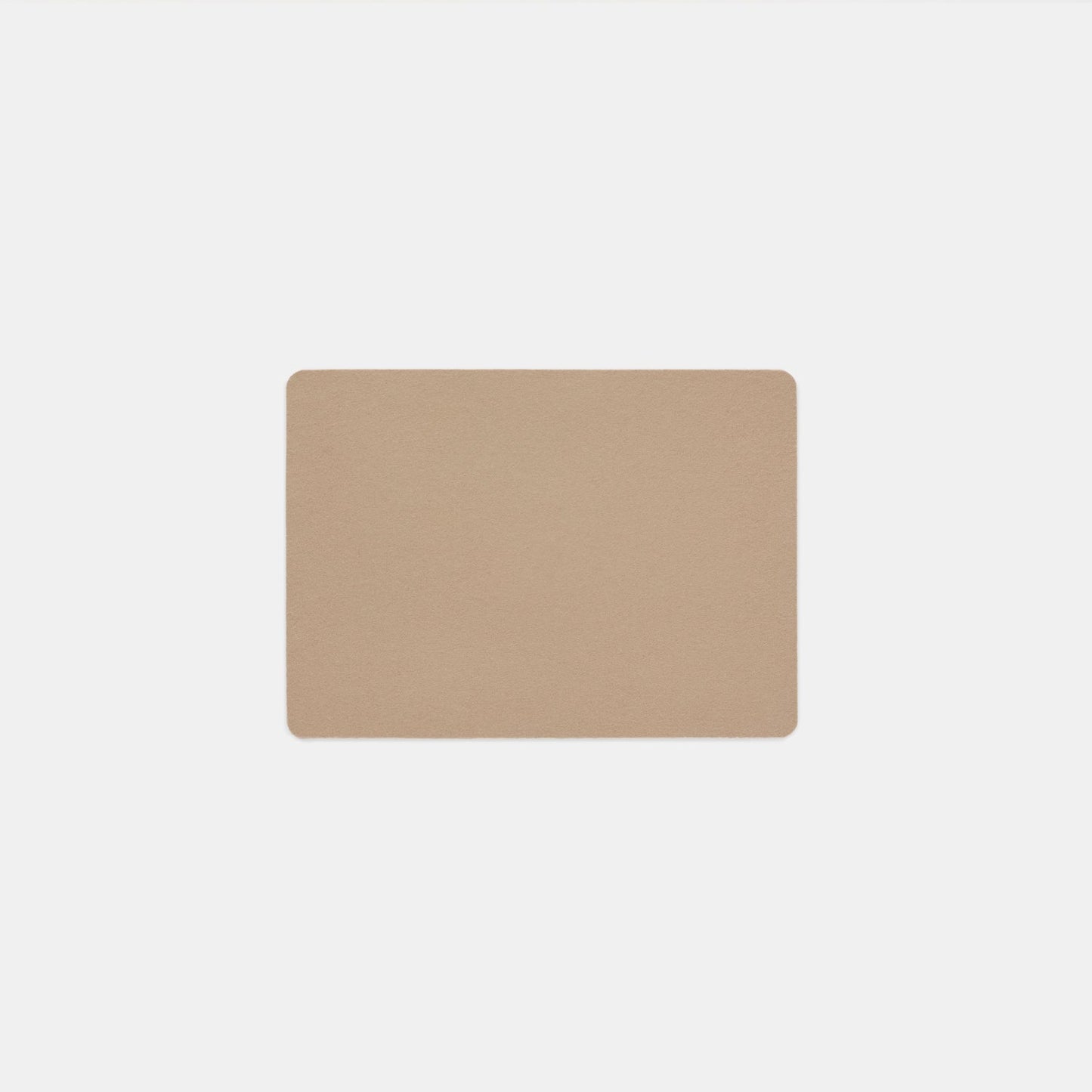 A rectangular, beige Felt Tops product with rounded corners is centered on a plain white background.