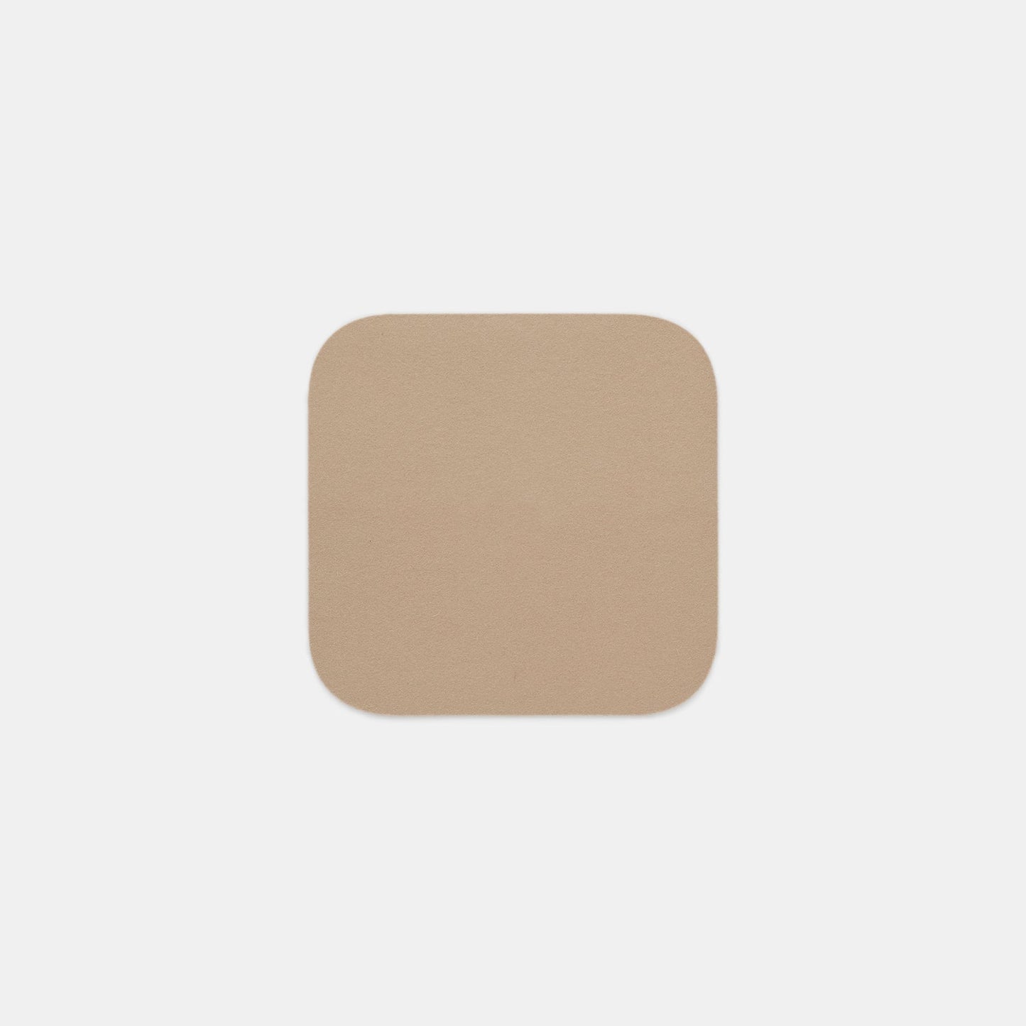 A single, plain, beige Felt Tops square with rounded corners is centered on a white background.