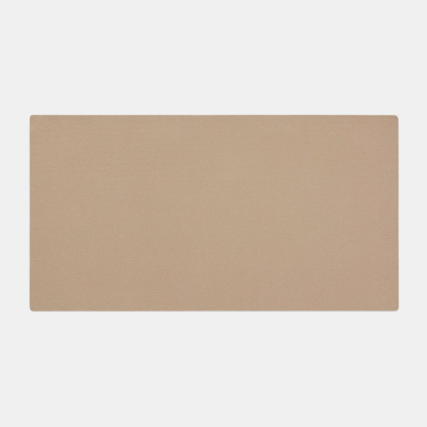 The Felt Tops rug is a rectangular beige piece with a plain, solid color design, displayed against a white background.