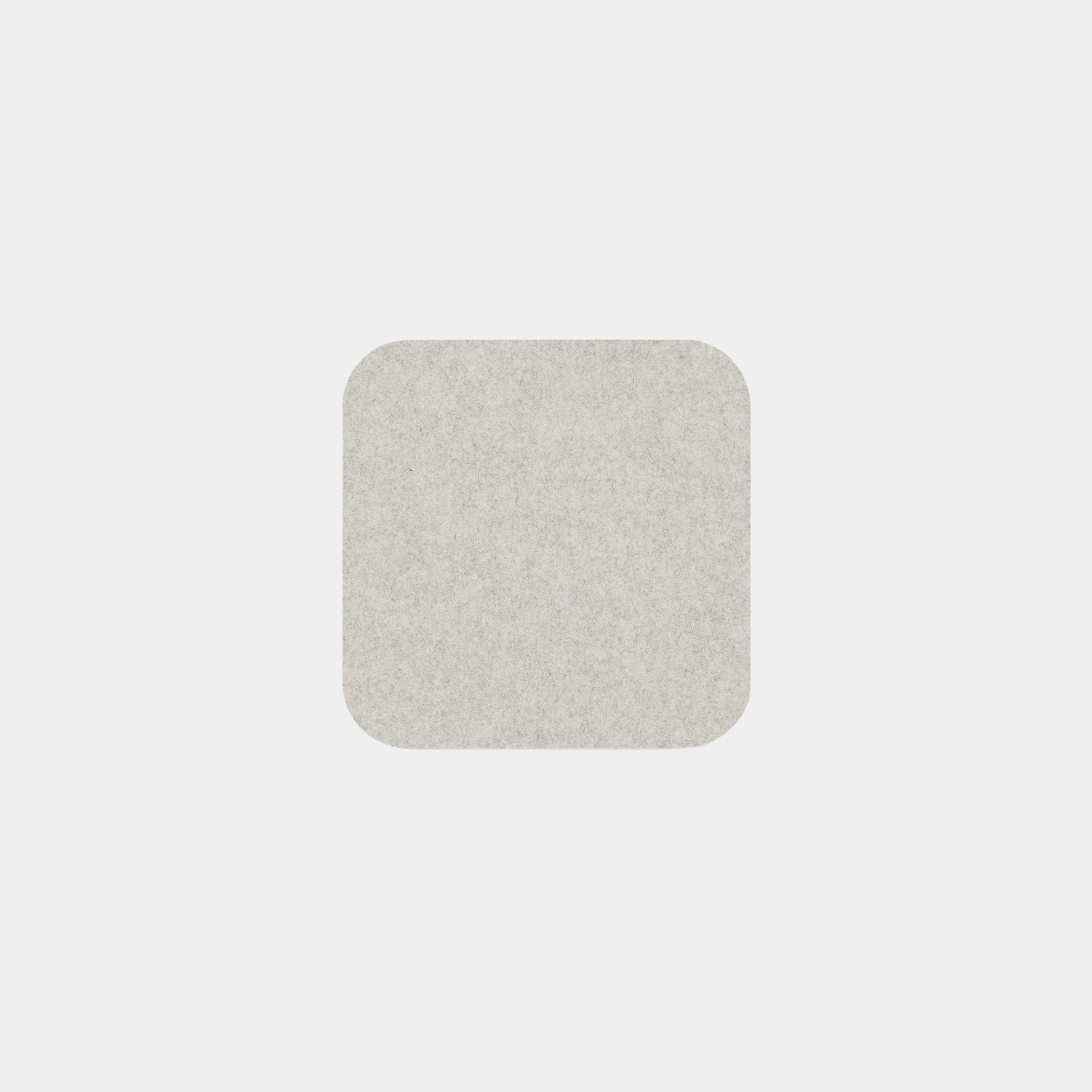 A Felt Tops product, featuring a light gray square with rounded corners, is centered on a plain white background.