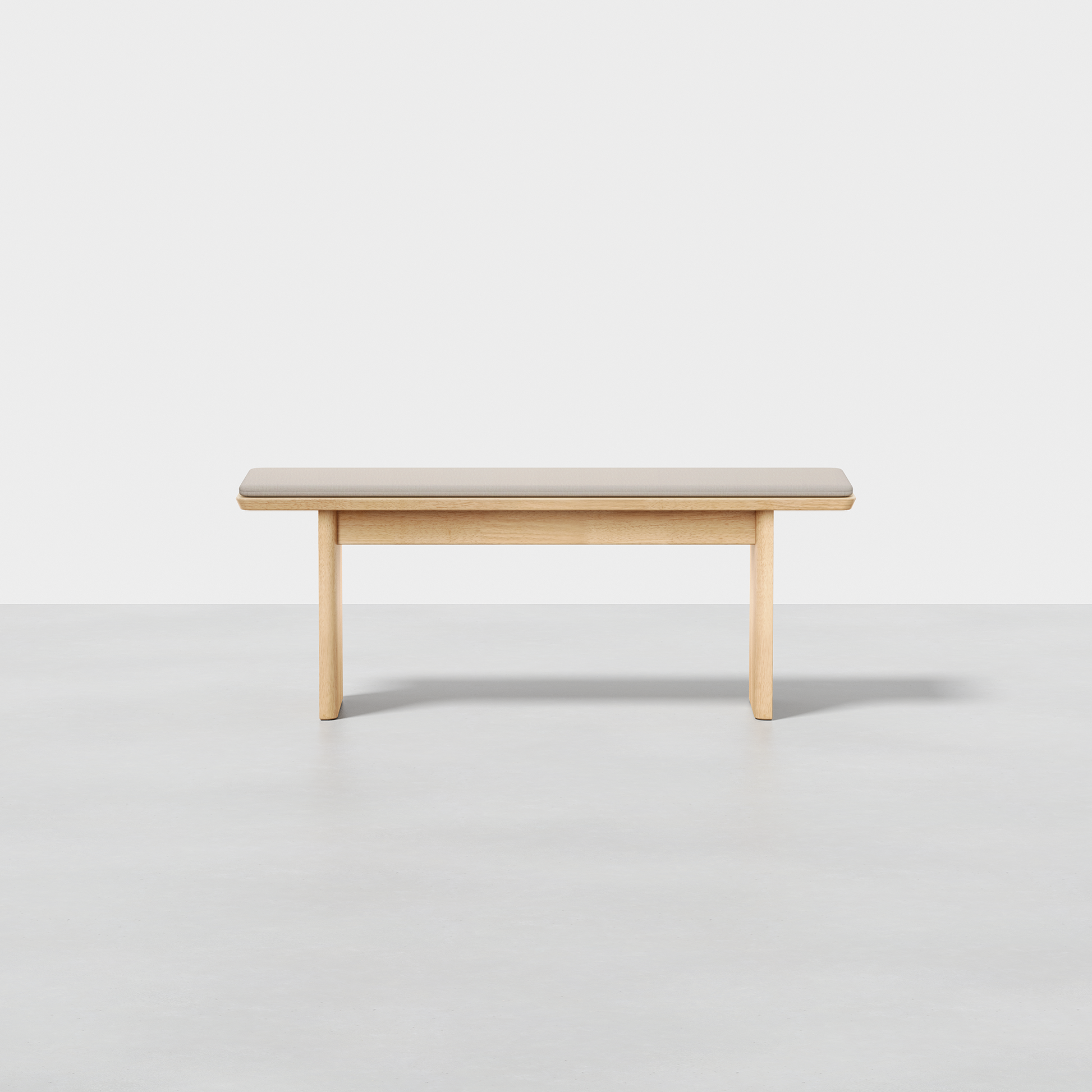 The Pillar Bench is a minimalist wooden bench featuring a flat seat and four straight legs, displayed against a plain white background.