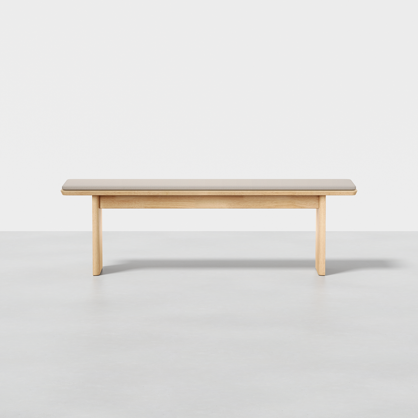 The Pillar Bench is a simple, rectangular bench made from light-colored wood with a clean, minimalist design, shown against a plain white background.