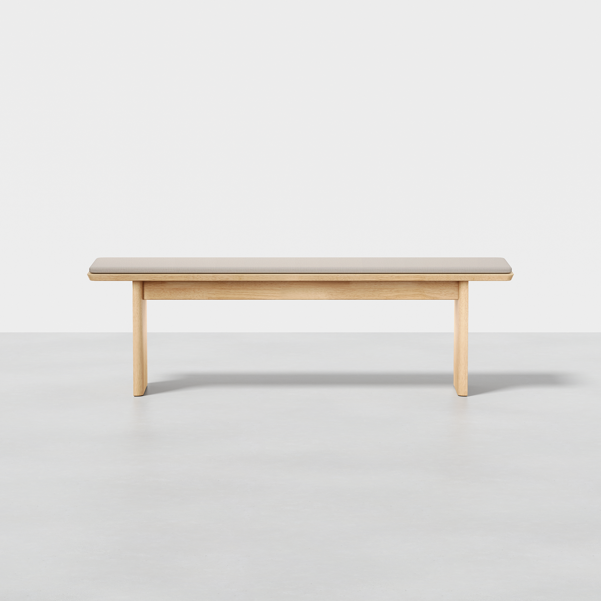 The Pillar Bench is a simple, rectangular bench made from light-colored wood with a clean, minimalist design, shown against a plain white background.